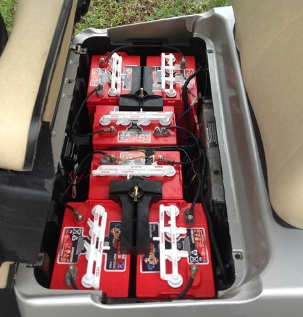 Image of a golf cart with different types of batteries