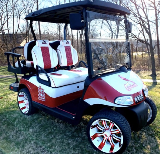 A golf cart decorated with a sports team theme